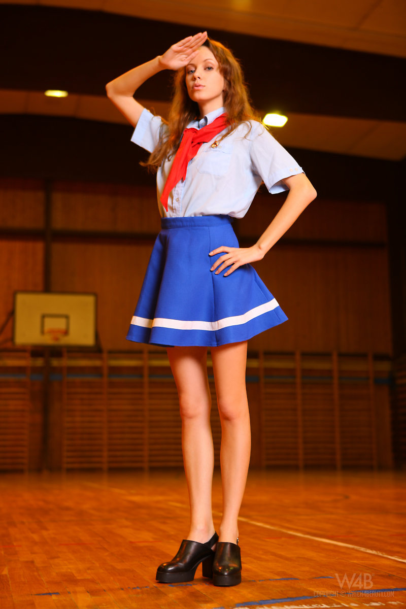 Young naked girl wearing blue mini skirt 2