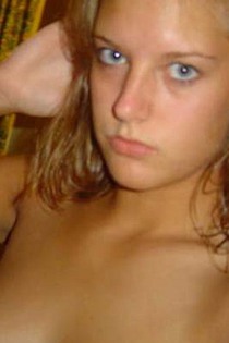 Sexy blue eyed chick displays her tits on cam-02