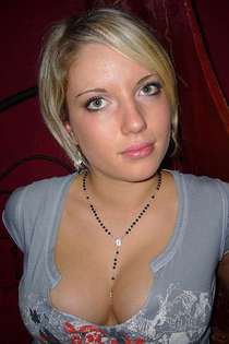 Blonde-haired busty teen gets naked and shows off-09