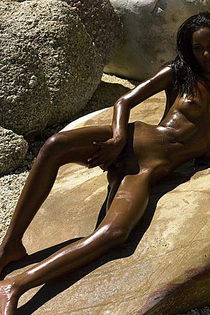 Naomi with her perfect ebony skin enjoys a little nude sun bathing on a hot summer day-04