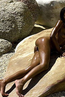 Naomi with her perfect ebony skin enjoys a little nude sun bathing on a hot summer day-06