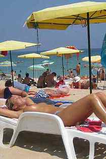 Topless amateur babes exposed at the beach-03
