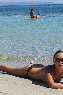 Topless amateur babes exposed at the beach-11