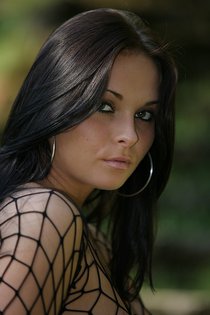 Performing a sexy striptease on her couch at home-10