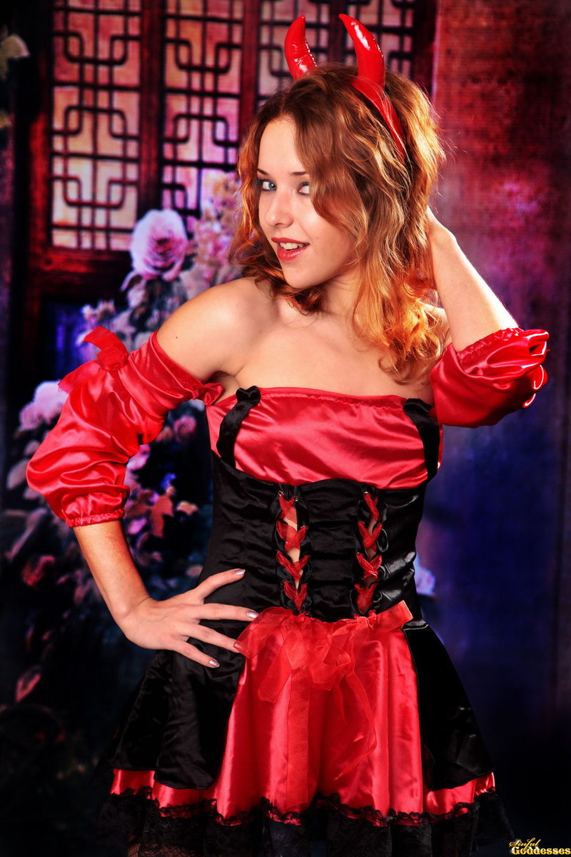 Cute devil in fishnet stockings is playing with her cunt 3