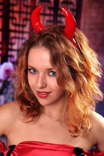 Cute devil in fishnet stockings is playing with her cunt-00